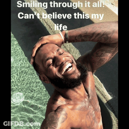 A Shirtless Man Is Smiling By A Pool With The Caption Smiling Through It All GIF