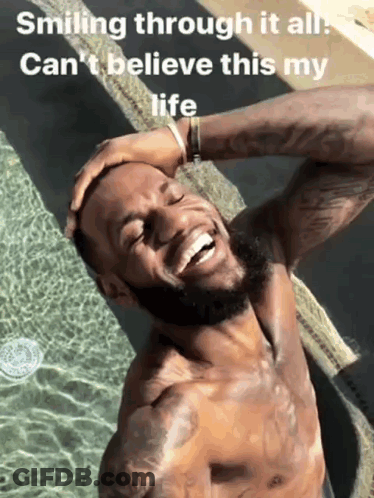 A Shirtless Man Is Smiling In Front Of A Pool With The Words Smiling Through It All Can 'T Believe This My Life GIF