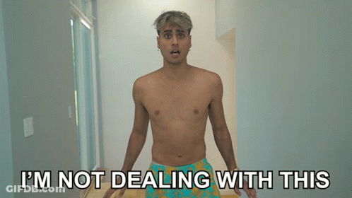 A Shirtless Man Is Standing In A Hallway With The Words I 'M Not Dealing With This Behind Him GIF
