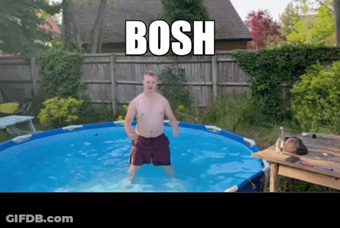 A Shirtless Man Is Standing In A Swimming Pool With The Words Bosh Above Him GIF