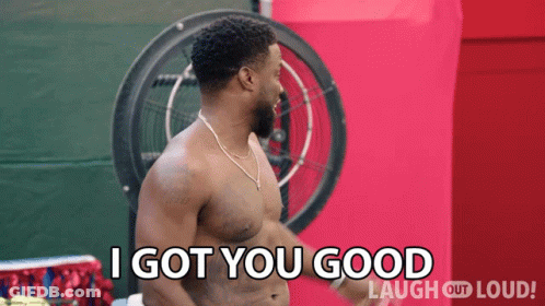 A Shirtless Man Is Standing In Front Of A Fan And Says I Got You Good GIF