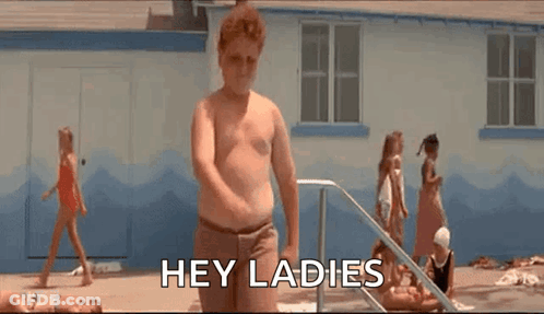 A Shirtless Man Is Standing In Front Of A Swimming Pool And Says `` Hey Ladies '' . GIF