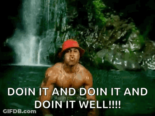 A Shirtless Man Is Standing In Front Of A Waterfall With The Words Doin It And Doin It And Doin It Well !!! GIF