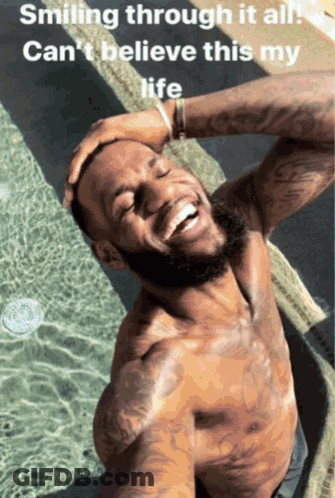 A Shirtless Man Is Taking A Selfie In A Pool With The Caption Smiling Through It All Can 'T Believe This My Life GIF