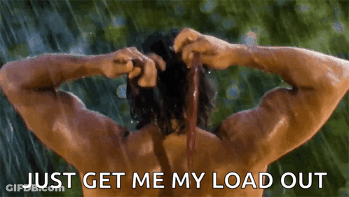 A Shirtless Man Is Taking A Shower In The Rain With The Words Just Get Me My Load Out Above Him . GIF