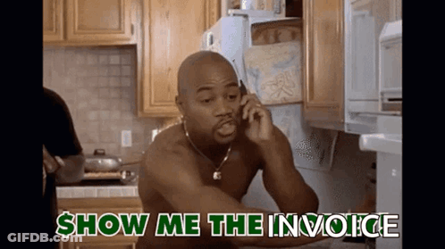 A Shirtless Man Is Talking On A Cell Phone In A Kitchen With The Words Show Me The Invoice Below Him GIF