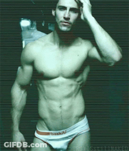 A Shirtless Man Is Wearing A Pair Of White Underwear That Says Basketball GIF
