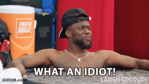 A Shirtless Man Laying In A Tub With The Words What An Idiot Laugh Out Loud GIF