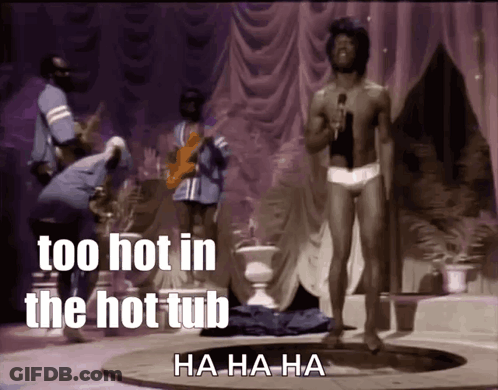 A Shirtless Man Singing Into A Microphone With The Words Too Hot In The Hot Tub GIF
