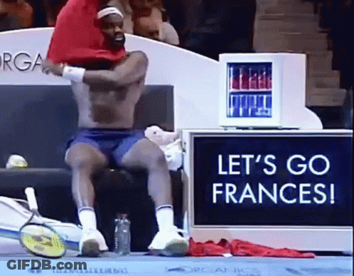 A Shirtless Man Sits In Front Of A Sign That Says " Let 'S Go Frances " GIF
