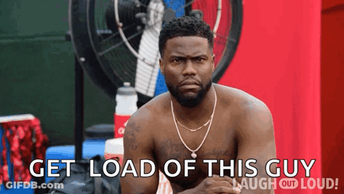 A Shirtless Man Sitting In Front Of A Fan With The Words Get Load Of This Guy Laugh Out Loud GIF