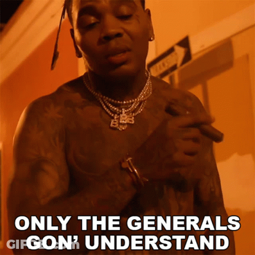 A Shirtless Man Smoking A Cigar With The Words Only The Generals Gon ' Understand Above Him GIF