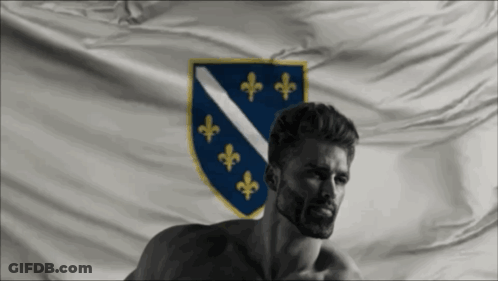 A Shirtless Man Stands In Front Of A Flag With The Coat Of Arms On It GIF
