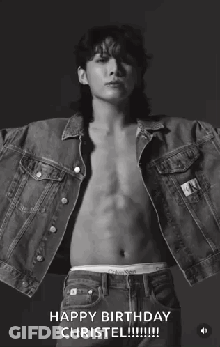 A Shirtless Man Wearing A Calvin Klein Denim Jacket GIF