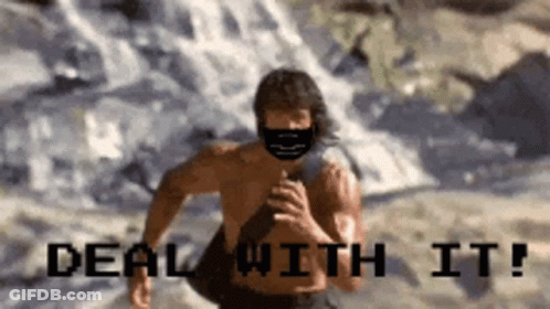 A Shirtless Man Wearing A Mask Is Running In Front Of A Waterfall With The Words Deal With It Below Him . GIF