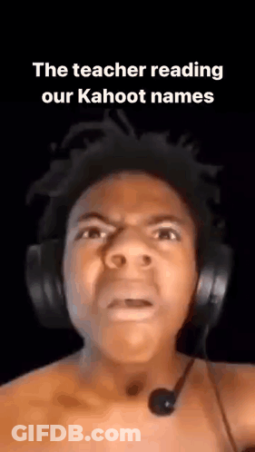 A Shirtless Man Wearing Headphones And A Microphone . GIF