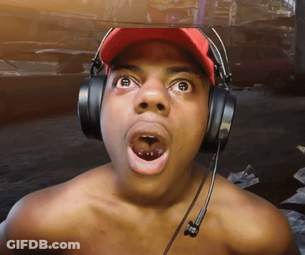 A Shirtless Man Wearing Headphones And A Red Hat Has His Mouth Wide Open GIF