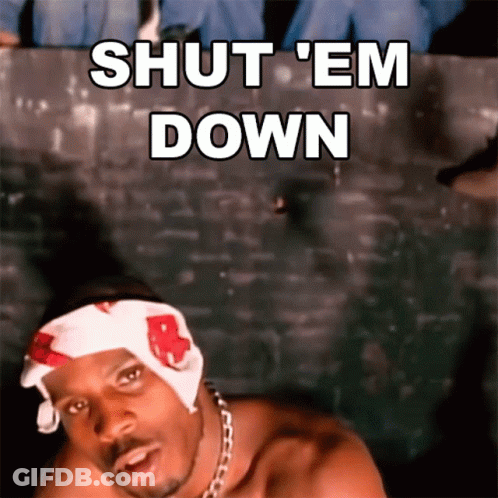 A Shirtless Man With A Bandana On His Head Says Shut 'Em Down GIF