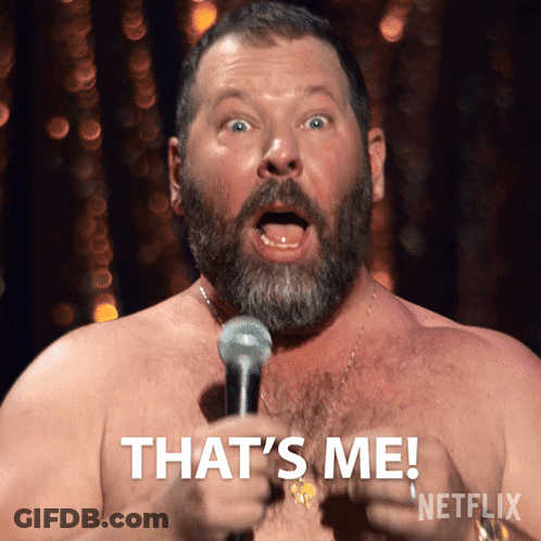 A Shirtless Man With A Beard Is Holding A Microphone And Says That 'S Me GIF