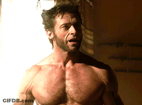 A Shirtless Man With A Beard Looks At The Camera With His Mouth Open GIF