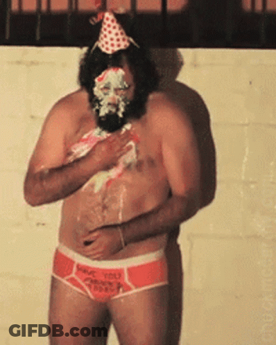 A Shirtless Man With A Birthday Cake On His Face Is Wearing Underwear That Says Have You Tried GIF