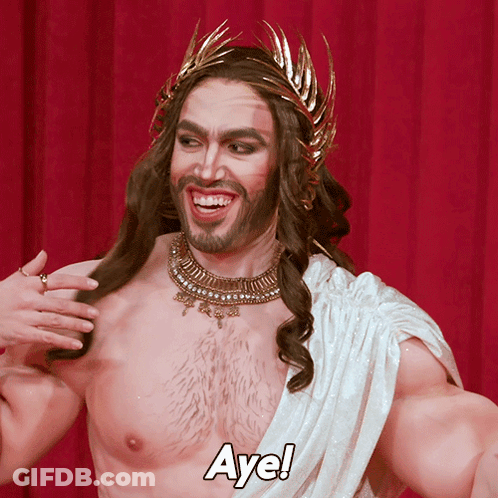 A Shirtless Man With A Crown On His Head And The Word Aye On His Chest GIF