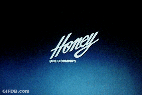 A Shirtless Man With A Tattoo On His Chest Stands In Front Of A Sign That Says Honey Are U Coming GIF