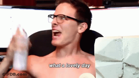 A Shirtless Man With Glasses Says " What A Lovely Day " In Front Of A Computer Screen GIF