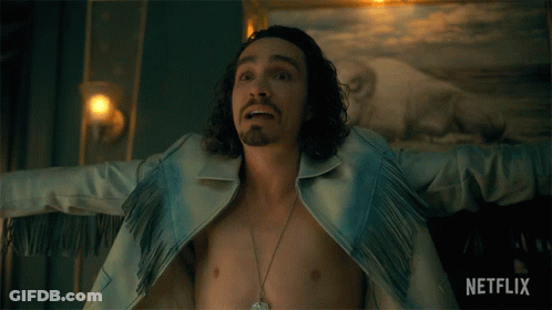 A Shirtless Man With His Arms Outstretched In Front Of A Netflix Ad GIF