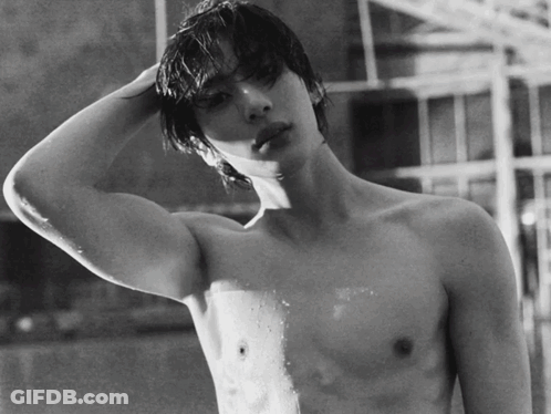 Shirtless Man With Hand On Head GIF