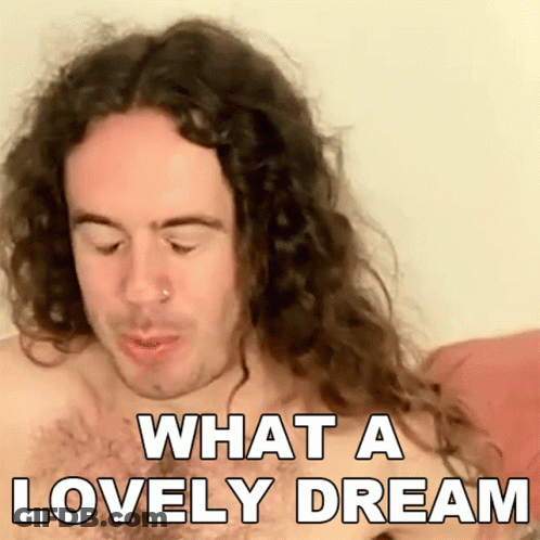 A Shirtless Man With Long Curly Hair Is Saying What A Lovely Dream GIF