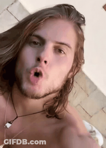 Man With Long Hair And Beard Making Funny Face GIF
