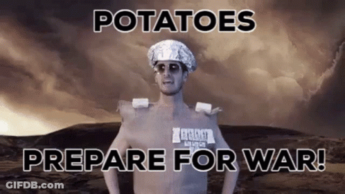 A Shirtless Man With Potatoes On His Head And The Words " Potatoes Prepare For War " On The Bottom GIF