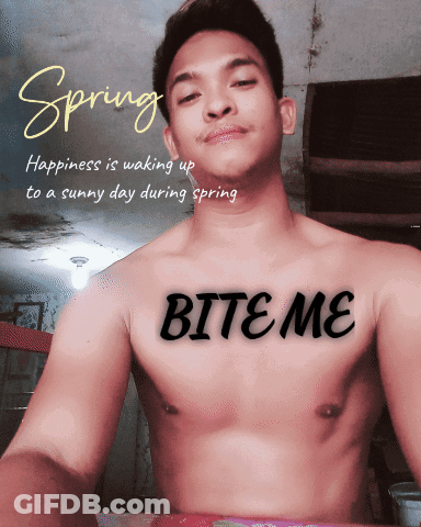 A Shirtless Man With The Word Bite Me Written On His Chest GIF