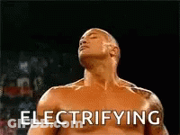 A Shirtless Man With The Word Electrifying On His Chest GIF