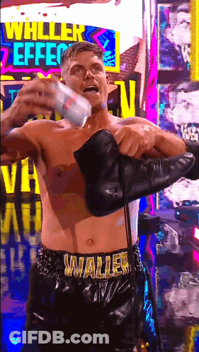 A Shirtless Walter Waller Is Holding A Can Of Soda GIF