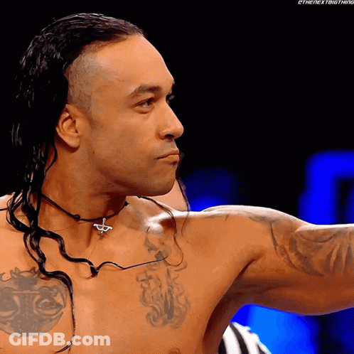 A Shirtless Wrestler Has A Necklace Around His Neck That Says ' The Next Thing ' GIF