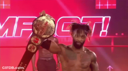 A Shirtless Wrestler Is Holding A World Heavyweight Championship Belt In Front Of A Pink And Purple Background . GIF