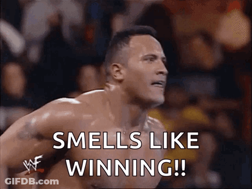 A Shirtless Wrestler Says Smells Like Winning In Front Of A Crowd GIF