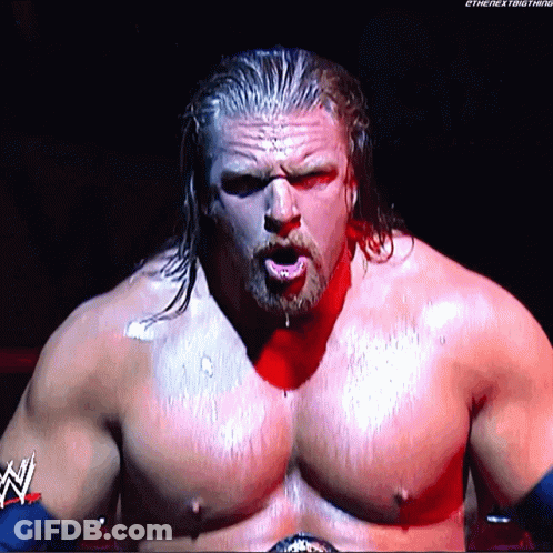 A Shirtless Wrestler With A Belt That Says The Next Thing GIF