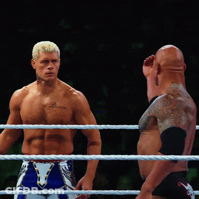 A Shirtless Wrestler With A Tattoo On His Chest That Says Deluxe GIF