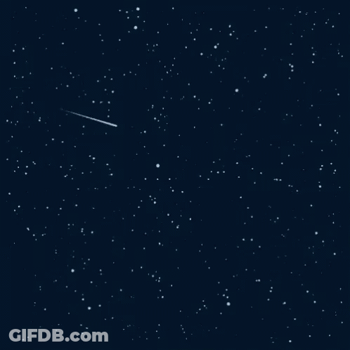 A Shooting Star In The Night Sky With Many Stars GIF