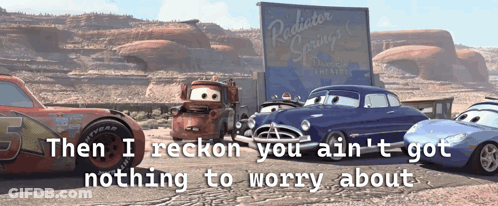 A Sign For Radiator Springs Is Displayed Behind A Group Of Cars GIF