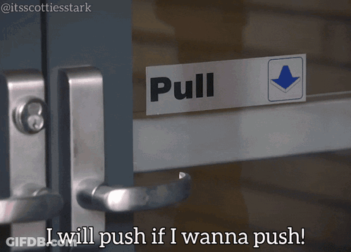 A Sign On A Door That Says Pull On It GIF