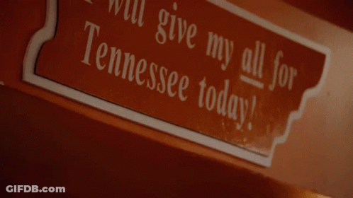 A Sign On A Wall That Says I Will Give My All For Tennessee Today GIF