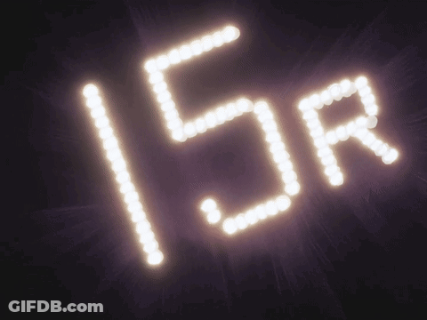 A Sign That Says 15R Is Lit Up In The Dark GIF