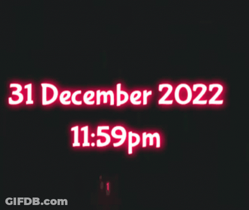 A Sign That Says 31 December 2022 And 11:59 Pm GIF
