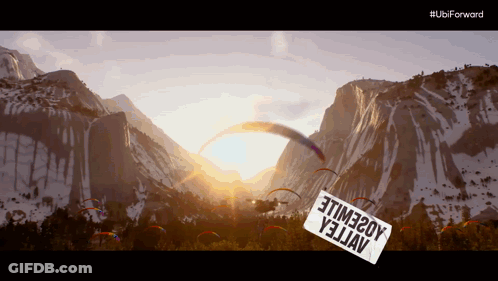 A Sign That Says 3Time20y Yellow Hangs From A Mountain GIF