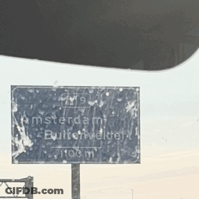 A Sign That Says Amsterdam Builtonwelter GIF