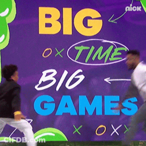 A Sign That Says Big Time Big Games With Two Men Standing In Front Of It GIF